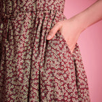 Burgundy floral cotton fit-and-flare dress with button-front bodice and side pockets