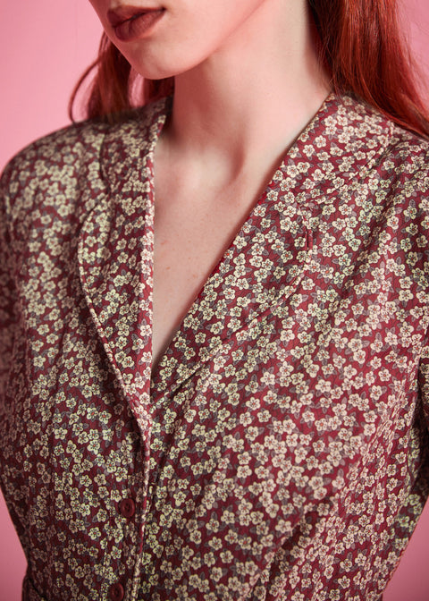 Close-up of notched collar and ditsy floral print on ModCloth cotton dress
