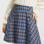 Studio close-up of blue and brown plaid Sailor Flare Skirt showing high waist, double button rows and flared silhouette