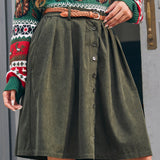 Women's pleated corduroy A-line skirt in olive green with functional button front