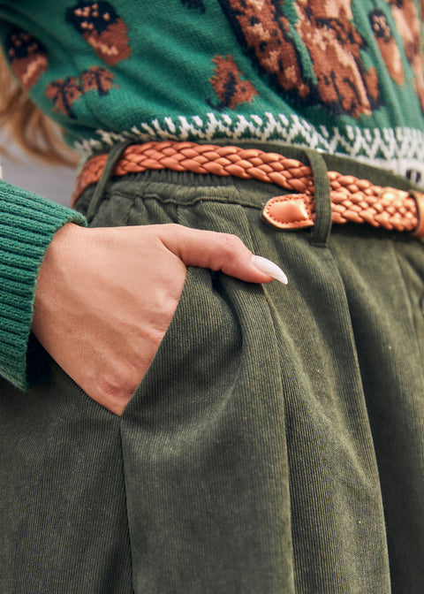 Women's olive green corduroy skirt with high waist, front pleats and buttons