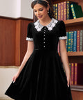 Woman wearing Laced With Charm Fit & Flare Dress in Black Velvet by ModCloth