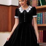 Woman wearing Laced With Charm Fit & Flare Dress in Black Velvet by ModCloth
