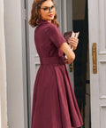 Burgundy corduroy fit and flare dress with full gathered skirt
