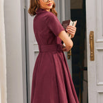 Burgundy corduroy fit and flare dress with full gathered skirt