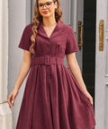 Vintage-inspired burgundy corduroy dress with notched collar and full skirt