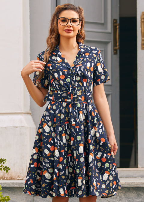 Woman wearing ModCloth Rustic Elegance mushroom print midi dress in Morel of the Story