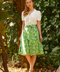 Full-length view of ModCloth The Garden Stroll Skirt in Hide & Squeak highlighting the lightweight cotton voile fabric, A-line midi silhouette, and playful storybook-inspired print.