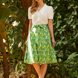 Full-length view of ModCloth The Garden Stroll Skirt in Hide & Squeak highlighting the lightweight cotton voile fabric, A-line midi silhouette, and playful storybook-inspired print.