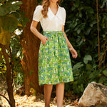 Woman wearing ModCloth The Garden Stroll Skirt in Hide & Squeak styled with a white Peter Pan collar blouse for a vintage-inspired spring outfit.