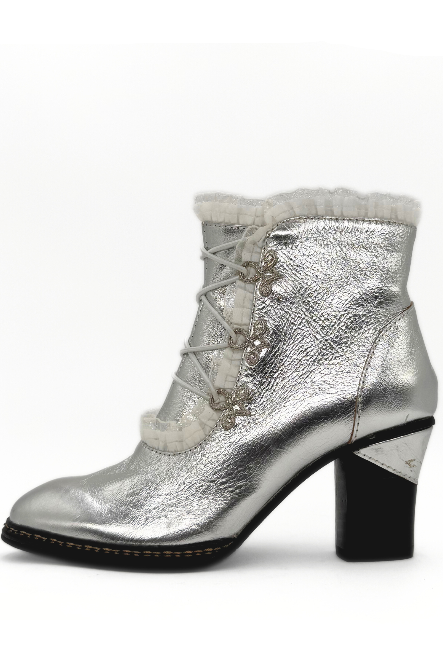 Silver metallic ankle boot with lace-up design on a white background