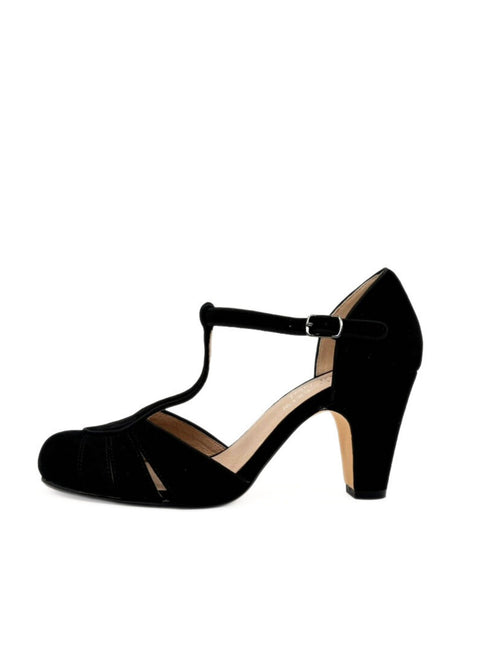 Black high-heeled shoe with a T-strap on a white background