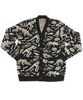 Black cardigan with white dinosaur skeleton pattern on a white background