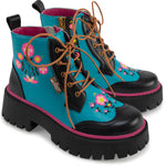 Colorful boots with floral designs on a white background