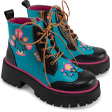 Colorful boots with floral designs on a white background