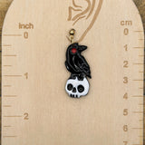 Salem - Crow on Skull Earrings: Handmade, Hand Painted, Polymer Clay