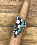 Lightning bold shaped artisan made sterling silver ring with checkered design and turquoise stone