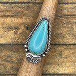 Artisan made sterling silver ring with teardrop Kingman blue Turquoise gemstone.