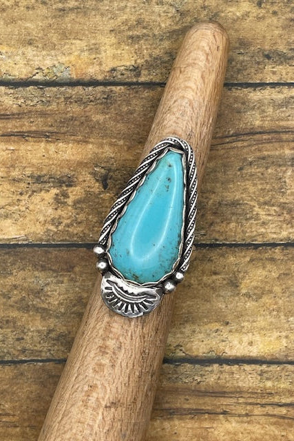 Artisan made sterling silver ring with teardrop Kingman blue Turquoise gemstone.