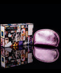 Pink makeup case with 'Thread Original' branding next to a colorful box on a black background