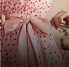 Close up shot of waist ribbon on dress