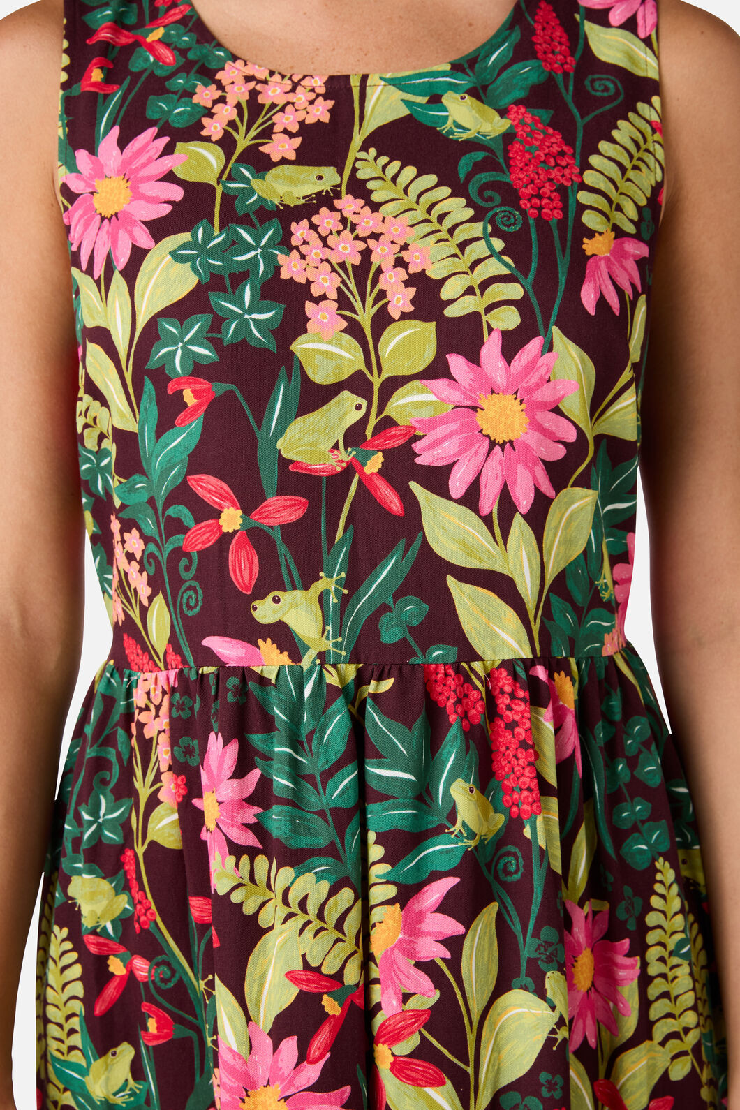 Dress with a vibrant floral and nature pattern on a dark background