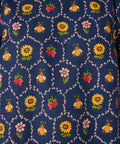 Navy blue fabric with colorful bee and floral pattern