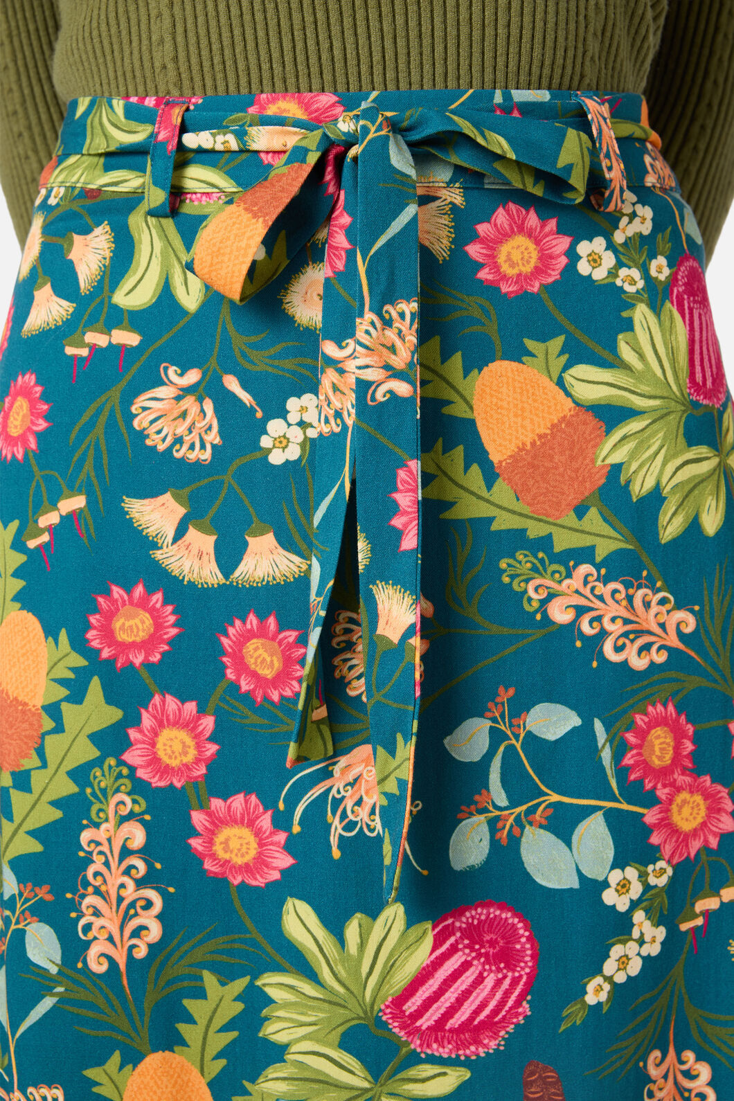 Colorful floral patterned skirt with a focus on vibrant colors and intricate design.