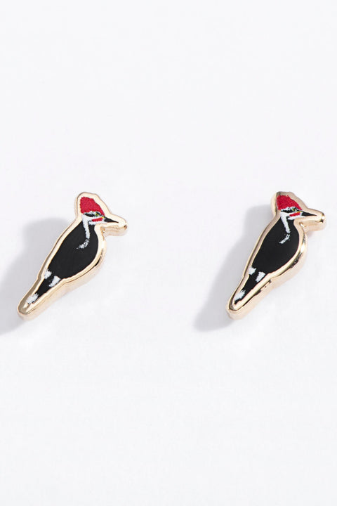 Pair of woodpecker bird-shaped earrings on a white background