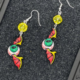 Tattoo - Eyeball Wing Earrings: Handmade Polymer Clay