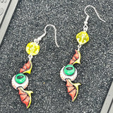 Tattoo - Eyeball Wing Earrings: Handmade Polymer Clay