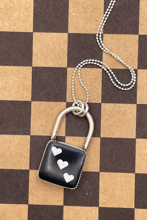 Lux - Onyx Dice with Heart Pips Faux Lock Pendant