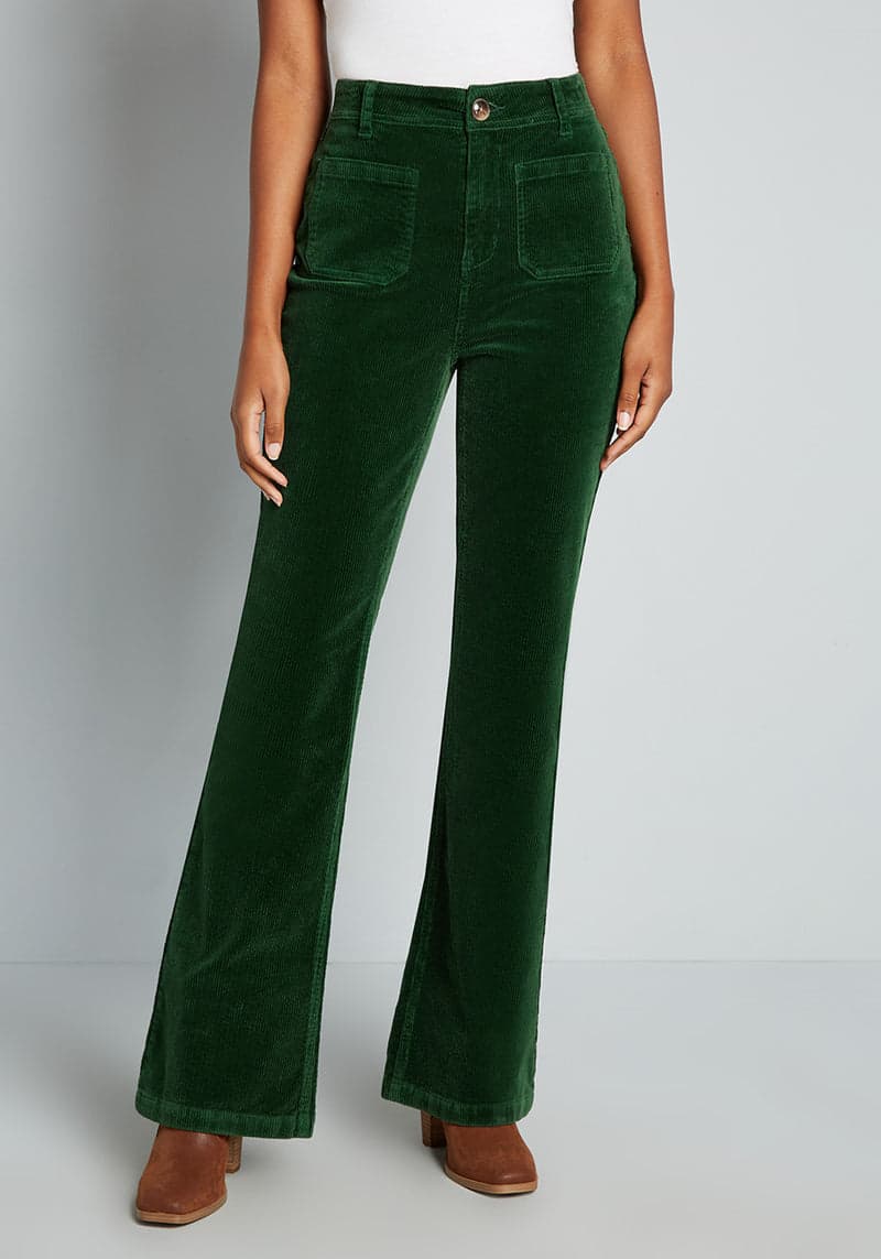 Rib-knitted high-rise flared pants in green - Self Portrait | Mytheresa